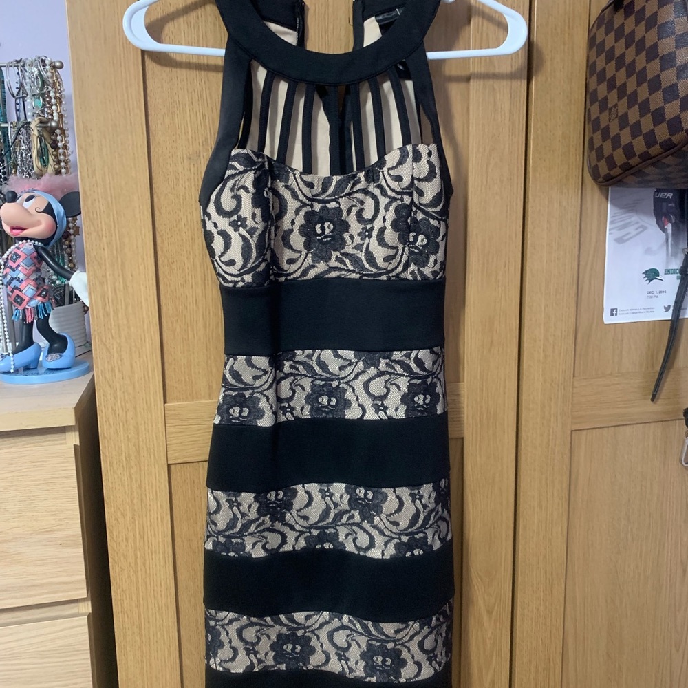 Gorgeous body con cage top black dress